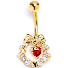 Product DetailsClear Red CZ Gem Gold Tone Heart Wreath of Love Belly Ring Deck your body with a wreath of love - like this 14 gauge navel ring. It's made with a 3/8 inch gold tone PVD over 316L surgical grade stainless steel curved barbell with a 5mm top ball end. The bottom end features a festive wreath charm with a bow embellishment at the top and clear cubic zirconia gems all along the bottom. The wreath is further embellished by a dangling red cubic zirconia gem heart. No matter what the sea Gold Heart-shaped Body Jewelry As Gift, Adjustable Body Jewelry For Valentine's Day, Gothic Princess, Belly Piercing Jewelry, Navel Jewelry, Dangle Belly Rings, Festive Wreath, Navel Ring, Belly Piercing