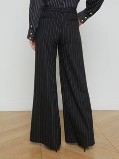 Fitted through the hips and relaxed through the leg, the Allanah is a polished, modern trouser with a flattering fit.• Stretch pinstripe suiting• Mid-rise straight-leg• Side slant pockets• Back welt pockets• Zip fly and hook and bar closure | L'AGENCE Allanah Pinstriped Trouser In Black/Ecru Lace Coat, Knit Denim, Velvet Lace, Denim Coat, Skirted Swimwear, Welt Pockets, Winter Collection, Jumpsuit Dress, Blazer Jacket