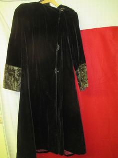 Victorian Black Formal Outerwear, Victorian Black Winter Outerwear, Black Historical Winter Outerwear, Black Victorian Long Sleeve Outerwear, Black Historical Fitted Outerwear, Fitted Victorian Black Outerwear, Fitted Black Victorian Outerwear, Victorian Black Outerwear With Buttons, Black Victorian Outerwear With Buttons