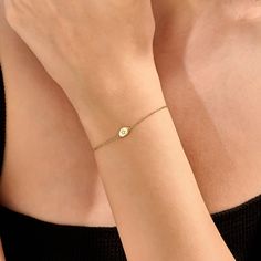 Adorn your wrist with the Diamond Solitaire Star Bracelet, crafted in 14k Solid Gold. This delicate bracelet features a tiny single diamond set in a small oval design, perfect for stacking. A handmade piece of elegance for women. 𝐈𝐭𝐞𝐦 𝐃𝐞𝐭𝐚𝐢𝐥𝐬 * Gold KT: 14KT  * Custom Gold Color: Yellow Gold  * Chain Width 5 mm x 9 mm 𝐆𝐞𝐦𝐬𝐭𝐨𝐧𝐞 𝐃𝐞𝐭𝐚𝐢𝐥𝐬  * Gemstone Ctw: 0.01 Ctw  ▶ Want to find out more 𝐛𝐫𝐚𝐜𝐞𝐥𝐞𝐭𝐬? https://etsy.me/3wt3nc6 ▶ Want to find out more? See our storefron Oval Rose Gold Bracelet As Gift, Oval Rose Gold Bracelet For Gift, Rose Gold Oval Bracelet Gift, Oval Gold Diamond Bracelet As Gift, Oval Gold Diamond Bracelet For Gift, Adjustable Oval 14k Gold Bracelet, Adjustable Oval Dainty Bracelets, Dainty Oval Adjustable Bracelets, Dainty Gold Oval Bracelets