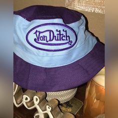 Von Dutch Childs Hat Nwot Casual Purple Hat For Streetwear, Cute Blue Bucket Hat, Blue Fun Style Bucket Hat For Outdoor, Trendy Purple Bucket Hat With Curved Brim, Blue Fun Bucket Hat For Outdoor, Fun Blue Bucket Hat For Outdoor, Trendy Purple Bucket Hat, Trendy Purple Bucket Hat For Spring, Purple Outdoor Hat For Spring