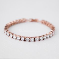 Glamorous and chic, set in an array of round cut CZ on rose gold plating. This simply gorgeous cubic zirconium bracelet is breath-taking. Perfect for weddings, Bridal Accessories Belt, Bridal Bracelet, Pretty Jewellery, Gold Wedding, Bridal Accessories, Silver Bracelets, Gold Plating, Rose Gold Plates, Rose Gold Ring