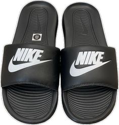 Nike Open Toe Slides With Rubber Sole, Nike Black Slide Sandals, Casual Nike Flip Flops, Black Nike Synthetic Flip Flops, Nike Black Open Toe Slides, Nike Casual Slip-on Flip Flops, Casual Nike Slip-on Flip Flops, Black Open Toe Flip Flops For Streetwear, Nike Black Open Toe Sandals