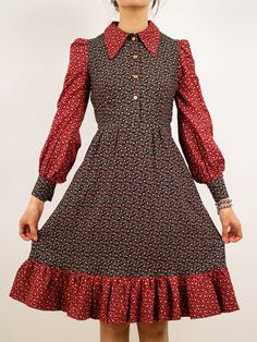 Product details:     era: 70s    fabric content: cotton    colour: red/black    condition: great    measurements:    bust (around): 36"    waist (around): 28"     sleeve length: 25"    length: 42"    models measurements:    shoulder - shoulder: 17"    bust: 33"    waist: 25"    hip: 37"    height: 5'10" Retro Prairie Dress For Fall, Red Cotton Vintage Dress, Red Vintage Dress For Fall, Red Long Sleeve Vintage Dress, Retro Cotton Vintage Dress For Fall, Retro Long Sleeve Prairie Dress, 70s Fabric, Sixties Fashion, Paisley Dress