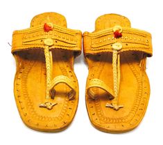 Check out our brand-new, genuine handcrafted Kolhapuri sliding sandals from India, high-quality leather sandals with an ethnic Indian toe strap that are incredibly comfortable and simple to use. The leather is prepared in such a way that it has no allergenic characteristics at all and feels light, smooth, and silky. Hand stitching and punching are being used. These unisex slippers are ideal for everyday use as well as for any formal event. We offer various different shoe styles. For more of our selection, visit our page! We send packages to you promptly and well packaged for a safe journey. We appreciate your support of our little business. Shipped from the USA. Traditional Brown Toe Post Flip Flops, Traditional Handmade Brown Flip Flops, Traditional Slip-on Toe Ring Sandals For Beach, Traditional Closed Toe Toe Ring Sandals For Festivals, Traditional Toe Ring Slip-on Sandals For Beach, Traditional Adjustable Brown Flip Flops, Traditional Festival Sandals With Leather Sole, Traditional Slip-on Sandals For Festivals, Traditional Brown Flip Flops For The Beach