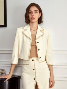 Editor's Notesyyiam curates feminine and classic daily outfits that suit well to modern women.- Crop jacket design- Made of tweed fabric- Button-down design- Vintage gold buttons- Feminine and sophisticated mood Measurements(in.)[S / M]- Length: 16.93 in. / 17.32 in. - Shoulder Length: 16.93 in. / 17.32 in. - Waistline: 31.89 in. / 33.46 in.- Bust: 38.16 in. / 39.76 in.- Sleeve Length: 18.90 in. / 19.29 in.* Model info: Size S / Height 5' 7 Composition & Care- Material: 78% Polyester, 20% Cotton, 2% Nylon- Light hand wash or dry cleaning recommended Designer- by yyiam Chic Cream Tweed Blazer, Elegant Cream Tweed Jacket Single Breasted, Elegant Cream Single Breasted Tweed Jacket, Elegant Cream Single-breasted Tweed Jacket, Elegant Cream Tweed Blazer, Elegant Gold Tweed Jacket For Work, Chic Cream Tweed Jacket For Formal Occasions, Beige Button-up Tweed Jacket For Work, Chic Cream Tweed Jacket For Office