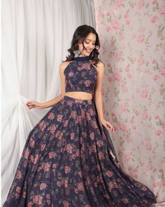 Description :A beautiful blue violet lehenga, flare illustrating floral imagery prints, paired with a halter blouse and a net dupatta with 4 side borders.The Lehenga can also be paired with a full-sleeve blouse, please connect to customiseColour : VioletFabric : Chanderi SlubCare : Dry Clean onlyFit : fit and flareThe model is wearing S size Elegant Semi-stitched Floral Print Choli, Floral Print Fitted Sets For Reception, Fitted Floral Print Lehenga With Traditional Drape, Fitted Lehenga With Floral Print In Traditional Drape, Fitted Lehenga With Floral Print And Traditional Drape, Unstitched Floral Print Choli For Party, Blue Floral Print Sets For Festivals, Blue Floral Print Festival Sets, Bollywood Style Fitted Floral Lehenga