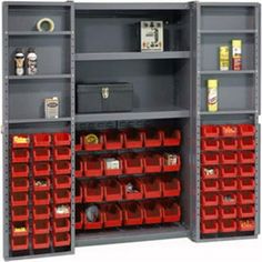 the storage cabinets are full of many different containers and bins, all with red trays on them