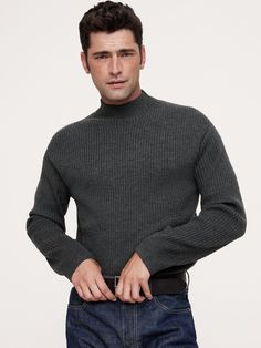 Using our warmest Merino wool, this luxe mock-neck sweater is crafted with a textured rib stitch in a relaxed fit.  Relaxed fit.  Responsible Wool Standard Certified: This global standard protects the sheep that supply the wool for this garment as well as the land they graze, working to make it better for the environment and the sheep.  Mock-neck.  Straight hem.  Relaxed fit.  Long sleeves.  Hip length.  Model: Size M, 6'2" (188cm). Rib Stitch, The Sheep, Mens Fall, Mock Neck Sweater, Outerwear Sweater, Hip Length, Men's Style, The Land, Charcoal Grey