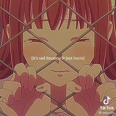 an anime character with red hair is looking through a fence and has his hands behind the bars