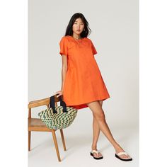 Orange cotton poplin (97% Cotton, 3% Spandex). Shift. Short sleeve. Crew neckline. Side Pockets. 33.5" from shoulder to hemline. Imported. Chic Cotton T-shirt Dress For Summer, Cotton Short Sleeve Dress For Day Out, Spring Cotton Shift Shirt Dress, Chic Cotton T-shirt Dress For Spring, Relaxed Fit V-neck T-shirt Dress For Summer, Cotton Shirt Dress For Day Out, Cotton Shift Shirt Dress Knee-length, Knee-length Cotton Shirt Dress, Casual Cotton Knee-length Short Sleeve Dress