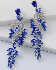 Blue Rhinestone Fabulous Drop Earrings Stainless Steel Drop 3.9" Material:Zinc Alloy Color:Blue Earring Studs Materials:Stainless Steel Sapphire Dangle Crystal Earrings For Party, Sapphire Crystal Dangle Earrings For Party, Sapphire Crystal Earrings For Party, Blue Jeweled Crystal Earrings For Party, Blue Crystal Chandelier Earrings For Party, Blue Crystal Earrings With Sparkling Stones For Party, Glamorous Blue Crystal Earrings For Party, Glamorous Blue Chandelier Earrings For Party, Blue Stud Earrings