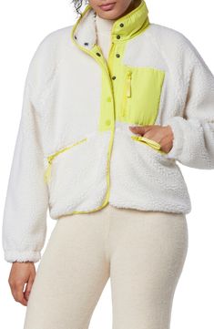 Stay cozily warm this season with this mixed media zip jacket with fleece contrasting. 22" length (size S) Stand collar 100% polyester Machine wash, line dry Imported Model stats: 5'10" height, 32" bust, 25" waist, 36" hip. Model is wearing size S. White Zipper Track Jacket For Winter, Winter Nylon Fleece Jacket With Long Sleeves, White Outerwear With Zipper For Outdoor Activities, Fall Nylon Fleece Jacket With Fleece Lining, Fall Nylon Fleece Jacket, White Fleece Track Jacket For Outdoor, White Sporty Fleece Jacket For Cold Weather, Sporty Sherpa Fleece Jacket For Fall, Sporty White Fleece Jacket For Cold Weather