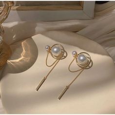 Boutique Pearl Earrings With Long Chain Measurement: As In Picture Color: Gold Material: Gold Plated Alloy, Faux Pearl, Needle Is Made Of 925 Silver. Open To Offers To Prevent Tarnish, Please Keep It Away From Heat, Water And Any Chemical Substances. Minimalist White Jewelry For Party, Chic White Earrings With Pearl Chain, Pearl Chain Round Metal Earrings, White Pearl Chain Earrings In Metal, White Metal Earrings With Pearl Chain, Long Chain Earrings, Chemical Substances, Long Tassel Earrings, Butterfly Jewelry