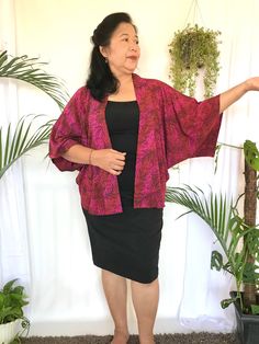 "100% Rayon Short Kimono Jacket in Red Leaves Batik Handmade in Bali. A good pair with jeans and an elevated looks for your basics outfit.  Suitable for any casual to formal event, such as Office Gathering, afternoon Stroll, university and school events, Chinese New Year Outfit.  The Size of this open kimono jacket is one fit for all sizes. A versatile wardrobe that suitable for Petite to Plus Size body figure. Garment Measurements 60,96 cm Length (from high-point shoulder) x 152.4 cm Bust x 53.34 cm Sleeve (center neck to cuff) 24\" Length (from high-point shoulder) x 60\" Bust x 21\" Sleeve (center neck to cuff) Please contact me for personalized and customized sizing." Casual Long Sleeve Batik Print Outerwear, Casual Long Sleeve Outerwear With Batik Print, Casual Batik Print Outerwear For Fall, Casual Batik Print Outerwear For Spring, Casual Spring Outerwear With Batik Print, Basics Outfit, Batik Handmade, Chinese New Year Outfit, Short Kimono Jacket