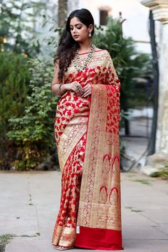 Red handwoven banarasi saree featuring intricate zari floral jaal motifs highlighted with floral vine border. Comes with running blouse material.
Components: 1
Pattern: Handwoven
Type Of Work: Zari
Fabric: Sartin Silk
Color: Red
Other Details: 
Woven broad border
Saree Length (in mtrs): 5.5
Note: Stitched blouse worn by the model is not for sale
Occasion: Bride,Wedding - Aza Fashions Broad Border Saree, Vine Border, Border Saree, Saree For Women, Banarasi Saree, Blouse Material, Floral Vine, Banarasi Sarees, Not For Sale