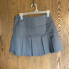 High Waisted Pinstriped Fold Pleated Skirt, Size M, Never Worn. Smoke Free Home. Casual Striped Pleated Bottoms, Fitted Striped Skort With Pleated Skirt, Casual Striped Pleated Mini Skirt, Striped Fitted Pleated Mini Skirt, Casual Pleated Striped Mini Skirt, Fitted Striped Mini Skort, Casual Striped Fitted Mini Skirt, Striped Pleated Fitted Skirt, Fitted Striped Skort With Lined Skirt