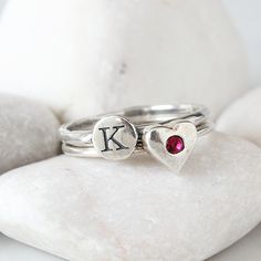 "Know someone with an January birthday ~ this is the perfect gift! Stackable birthstone rings are the IT accessory. Wear by itself or pair with with an initial ring! This listing is for one sterling silver stackable birthstone ring with a Swarovski crystal (please see color chart for color selection). Round, square, rectangle, marquise, heart or cross shapes available. Also available in January, February, March, April, May, June, July, August, September, October, November, or December here: http Mothers Ring Stackable, Stackable Birthstone Rings, Sterling Silver Stackable Rings, Birthstone Stacking Rings, Mothers Ring, July Birthstone Ring, January Birthstone Rings, Stackable Rings Silver, Mother Rings