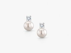 Freshwater Cultured Pearl and CZ Studs, Pearl Jewelry, Real Pearl CZ Studs, Genuine Pearl Studs, Bridal Jewelry, Pearl Wedding Earrings, Silver Pearl Studs, Pearl Bridesmaid Jewelry, June Birthstone This 9mm freshwater culture pearl with cubic zirconia earring is shiny, gorgeous, elegant and graceful . Best jewelry for women, girls to attend parties, weddings or any other activities. .CRAFTED : 925 Sterling Silver Rhodium Plated for a life-time luster. Stamped 925, high polished finish, nickel f Classic White Bridal Earrings With Brilliant Cut, Classic White Diamond Bridal Earrings, Classic Pearl White Cubic Zirconia Bridal Earrings, Elegant White Diamond Earrings For Wedding, Classic Pearl Earrings With Cubic Zirconia For Wedding, Classic Cubic Zirconia Pearl Earrings For Wedding, White Pearl Earrings With Diamond Accents For Wedding, Classic Cubic Zirconia Diamond Earrings For Wedding, Classic Wedding Pearl Earrings With Prong Setting