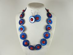 Contains small parts! Not for children! Choking Hazard!Statement mother of pearl red and blue necklace,  blue and red shell Pearl Necklace Necklace, blue necklace, red statement shell   Necklace measures approx. 19" plus an additional 4" inches with silver extender. 1 Strands, light weight. Closure is a  lobster clasp with silver extender chain with bead dangle. My beautiful jewelry makes warm and personal gift for you, your family and friends, and all come in jewelry boxes. Thank you for shoppi Handmade Blue Mother Of Pearl Jewelry, Adjustable Blue Shell Necklace For Gift, Handmade Red Shell Necklace For Gift, Handmade Red Shell Necklace Gift, Shell Jewelry, Blue Necklace, Shell Necklaces, Multi Strand Necklace, Strand Necklace