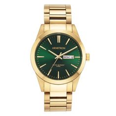 Make a splash with this striking gold-tone stainless steel watch from Armitron. With a luxurious emerald green sunray dial, gold-tone accents and a day/date window at three oclock, this watch is the perfect accessory for when you need to dress to impress. The gold-tone bracelet closes with an easy one touch fold-over buckle and is water resistant up to 165 feet. Size: 39 mm. Gender: male. Age Group: adult. Round Watch, Mens Dress, Steel Watch, Stainless Steel Watch, Gold Watch, Emerald Green, Green Dress, Men Dress, Dress To Impress