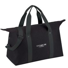 a large black bag with the word coach on it