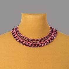 This elegant seed bead necklace is a testament to exquisite craftsmanship. Each bead is woven by hand, creating a unique and intricate pattern that is sure to draw attention. Perfect for both casual and formal occasions, this pink and black necklace adds a touch of sophistication to any wardrobe. Whether you're dressing up for a special event or adding a stylish accent to your everyday look, this bead collar necklace is a versatile and timeless accessory. --------------- Size This stunning bead Bead Collar Necklace, Beaded Collar Necklace, Necklace Elegant, Beaded Collar, Chain Extenders, Seed Bead Necklace, Black Necklace, Pink Beads, Timeless Accessories