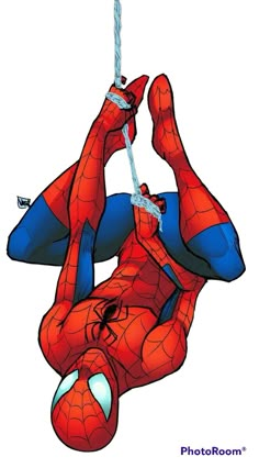 a spider man hanging upside down on a rope with his hands in the air and eyes closed