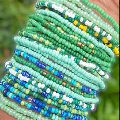 You will receive 10 assorted mixed green STRETCH STYLE seed bead bracelets. Bracelets will be chosen randomly and may/may not include the pictured selection.  This listing contains bracelets that STRETCH. Green Beach Jewelry With 108 Beads, Handmade Green Friendship Bracelets For Everyday, Handmade Green Friendship Bracelets Everyday, Handmade Green Beaded Bracelets For Everyday, Green Bracelets With Tiny Beads For Everyday, Handmade Green Friendship Bracelet For Everyday, Green Everyday Bracelets With Tiny Beads, Everyday Green Bracelets With Tiny Beads, Bohemian Green Letter Beads