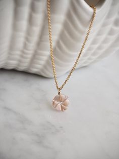 Pink mother of pearl flower charm necklace.  14 k gold filled dainty chain and pale pink mother of pearl shell carved into an adorable flower charm.  Each flower is highly detailed with a beautiful mother of pearl luster and is dangling off dainty yet sturdy high quality 14k gold filled cable chain. This necklace is perfect for wedding, for a bride and her bridesmaids, as well as flower girl gift.  Wear this necklace on its own, or layer it with other cute necklaces. Plese note that due to natur Beachy Necklaces, Pink Flower Necklace, Beachy Necklace, Dream Necklace, Flower Necklace Gold, Flower Charm Necklace, Gold Filled Necklace, Flower Girl Gifts, Dainty Chain