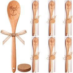 six wooden spoons with engraved names and coasters in clear boxes next to each other