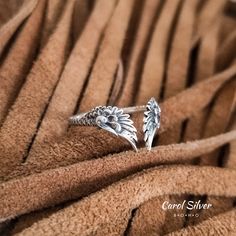 Wings of Ícarus Ring. -Material: 925 Sterling solid silver. Gentle on sensitive skin. -Adjustable size available. Ideally for sizes medium: 7 US - 8 US & 9 US.📏  -Front face height: 12 mm. -High quality jewel. Stamped 925 silver. -Handmade 🤲🏻 Embrace celestial beauty with our sterling silver 925 adjustable angel wings ring, delicately crafted to encircle your finger with ethereal grace. This stunning piece features intricately detailed angel wings that elegantly rest at the front, creating a captivating and angelic look. Perfect for adding a touch of heavenly charm to any outfit, this ring is a meaningful symbol of protection and guidance. Treat yourself or a loved one to this exquisite piece of angelic jewelry today! If you want to wear super curious and original silver necklaces, we a Angelic Jewelry, Ring With Wings, Pegasus Wings, Angel Wings Ring, Phoenix Wings, Wings Ring, Angel Wing Ring, Angel Ring, Angel Sculpture