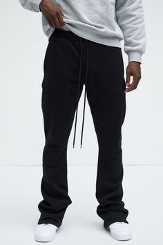 Model Height: 6'1 - Waist: 32 - Wearing Large Big & Tall: Height 6'3 - Waist: 42 - Wearing XXXL Available In Black. Elastic Waistband Drawstring Side Hand Pockets 60% Cotton, 40% Polyester Imported | Mens Tyson Skinny Stacked Flare Sweatpant in Black size Large by Fashion Nova Streetwear Full-length Drawstring Sweatpants, Casual Fitted Black Joggers, Casual Black Fitted Joggers, Fitted Cotton Drawstring Pants, Fitted Cotton Joggers With Drawstring, Fitted Black Casual Sweatpants, Fitted Sweatpants For Loungewear With Straight Hem, Fitted Pants With Ribbed Cuffs, Black Winter Bottoms With Drawstring