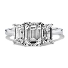 Add bold sparkle to any look with this lab-grown diamond ring. Crafted in bright 14-karat white gold  its classic three-stone design features one emerald cut center stone and two emerald cut side stones. Wedding Bands For Emerald Cut Rings, 3 Stone Diamond Ring, Stone Diamond Ring, Emerald Cut Rings, Emerald Engagement Ring Cut, Step Kids, Stone Design, Three Stone, Emerald Cut