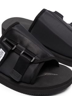 Why not slip into something a little more stylish? With a logo patch detail and a slip-on style - this pair of KAW-Cab slides from Suicoke tick every box. And they even come in one, how handy. Featuring an open toe, a front logo patch, a slip-on style, an open back and a ridged rubber sole. | Suicoke KAW-Cab slip-on slides Black Slip-on Sandals With Tang Buckle, Modern Black Slides With Buckle Closure, Casual Black Footbed Sandals With Tang Buckle, Casual Slip-on Slides With Tang Buckle, Casual Tang Buckle Slip-on Slides, Black Slide Mules With Buckle Closure, Black Slide Sandals With Buckle Closure, Casual Spring Slides With Tang Buckle, Black Slide Mules With Removable Insole