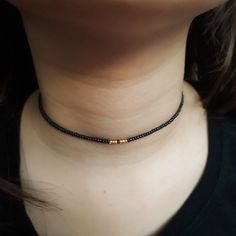 This choker / necklace is a great finish to any outfit.The fastening is a lobster type in addition to a 2 inch finish. You can choose from sizes 12 to 16 inches, the model size of the photo is 12 inches. In the middle there are 6 seed beads in gold or silver color, which are combined with a gold or silver clasp. Shipping: Each product is carefully packaged in a gift bag and packaged in an air bubble bag. Delivery time: we try to fulfill your orders as soon as possible.If the product is delayed for more than three weeks Please contact us. Every product in our store is made with a lot of love and positive energy.If you have further questions please do not hessitate to contact me. For more great gift ideas you can visit this link https://www.etsy.com/shop/FunnyartCrafts?ref=seller-platform-mc Trendy Black Beaded Choker Necklace, Black Choker With Tiny Beads For Gift, Adjustable Gold Beaded Choker Necklace, Black Tiny Beads Choker Necklace, Adjustable Black Choker With Tiny Beads, Gift Black Choker With Tiny Beads, Black Beads For Jewelry Making Choker, Adjustable Black Choker With Colorful Beads, Gift Black Beaded Choker Necklace