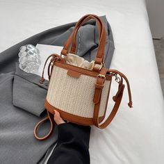 Rectangular Bucket Bag With Detachable Strap For Beach, Rectangular Bucket Bag With Detachable Strap For Vacation, Summer Beige Box Bag With Detachable Strap, Beige Summer Box Bag With Detachable Strap, Large Capacity Beige Box Bag For Beach, Beige Large Capacity Box Bag For Beach, Brown Beach Bag With Detachable Strap, Vacation Bucket Bag Satchel With Detachable Strap, Vacation Bucket Bag With Detachable Strap And Satchel Shape