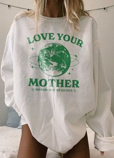 If you're the type of person who isn't afraid to fight for the planet, we might be best friends. Use this Love Your Mother granola girl aesthetic crewneck sweatshirt to show off your trendy, retro, hipster clothing vibe. If you're looking to gift the perfect activist VSCO sweatshirt to your favorite vegan or nature lover, this one is it!  We believe climate change awareness should be shouted from the rooftops and placed just about everywhere, from our heads to our toes and anywhere in between. T Hipster Clothing, Love Your Mother, Earth Day Shirt, Aesthetic Crewneck, Granola Girl Aesthetic, Aesthetic Sweatshirt, Retro Sweater, Hipster Outfits, Camping Outfits