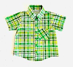 A St.Patrick inspired design tailored shirt . 100% cotton, cold wash only. Very nice print, collar and front chest pocket. Handmade with love and care! Plaid Cotton Shirt With Button Closure, Plaid Cotton Shirt With Pockets, Plaid Short Sleeve Cotton Flannel Shirt, Plaid Cotton Flannel Shirt With Short Sleeves, Summer Cotton Flannel Shirt With Button Closure, Cotton Flannel Shirt With Button Closure For Summer, Short Sleeve Plaid Flannel Shirt For Spring, Summer Cotton Button-up Flannel Shirt, Collared Cotton Flannel Shirt For Summer