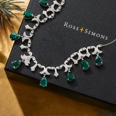 Ross-Simons - 20.00ct t. w. Emerald, .28ct t. w. Diamond Necklace in Silver. 16". Beauty on a budget! This 20.00 ct. t. w. pear-shaped emerald and .28 ct. t. w. round diamond necklace creates an elegant display glamorous enough for an appearance at a royal court or a red carpet event. Set in polished sterling silver and stationed on a rope chain with a 2" extender. Lobster clasp, diamond and emerald necklace. Emerald birthstones are the perfect gift for May birthdays. Formal Emerald Necklace With Brilliant Cut, Formal White Gold Emerald Necklace With Hand-set Stones, Formal White Gold Emerald Necklace With Hand Set, Formal White Gold Emerald Necklace Hand Set, Classic Emerald Necklace With Diamond Accents For Formal Occasions, Classic Emerald Necklace With Diamond Accents For Formal Events, Formal Silver Emerald Necklace With Diamond Cut, Elegant Emerald Necklace With Prong Setting For Formal Occasions, Formal Silver Emerald Necklace In Fine Jewelry Style