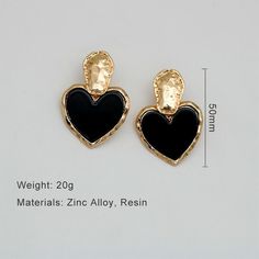 Discover Timeless Elegance Introducing our latest collection piece, the Black Heart Drop Earrings, a perfect blend of vintage charm and contemporary fashion. These earrings feature a classic heart shape, embodying love and elegance in every detail. Crafted from durable zinc alloy, they boast a glossy black finish that adds a touch of sophistication to any outfit. Ideal for women who adore fashion-forward accessories, these earrings are sure to make a statement at any event. Product Features Our Black Heart Drop Earrings are more than just a fashion statement. They are designed with the modern woman in mind, offering both style and comfort. The zinc alloy material ensures durability and long-lasting wear, while the heart-shaped design exudes romance and elegance. With their easy-to-wear dro Vintage Black Jewelry For Valentine's Day, Black Vintage Jewelry For Valentine's Day, Black Earrings For Valentine's Day, Black Heart-shaped Drop Earrings For Gift, Black Heart Earrings As A Gift, Black Heart Drop Earrings For Gift, Black Heart Earrings For Pierced Ears As Gift, Vintage Black Jewelry With Heart Charm, Black Heart Charm Earrings As Gift