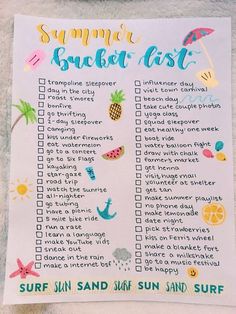 a printable summer bucket list on a towel