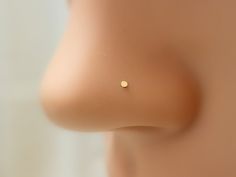 "BUY 3 GET ONE FREE Tiny 1mm flat head Extreme Thin Mini Stud 22 gauge(0.6mm). ★This listing is for one 14k gold filled or sterling silver very thin, tiny \"L\" shaped nose stud. This is 22 gauge which is smaller than your typical commercial studs which are usually 20/18 gauge. It is very comfortable and lightweight ★ Extra THIN 24 gauge: https://www.etsy.com/listing/219284793/tiny-nose-stud-14k-gold-filled-nose-stud?ref=shop_home_active_6 ★Great as a gift or treat yourself. The item will be sen Nice Piercings, Guys Ear Piercings, Tiny Nose Studs, Tiny Nose, Nose Pins, Gold Nose Stud, Nose Studs, Fake Piercing, Mini Studs