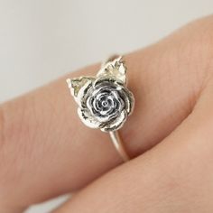 Embrace the beauty of nature with our 3D-printed Rose Ring. This intricately crafted piece captures the essence of a blooming rose, making it a stunning accessory for flower enthusiasts and nature lovers alike. Whether as a gift or a treat for yourself, this delicate and dainty ring is sure to make a lasting impression. Size: Varies by size about 2.5-3.5 tall and 1.2-1.3 thick Rose Making, Rose Flower Ring, Dainty Rose, Solid Gold Chains, Rose Ring, Blooming Rose, Lovely Jewellery, Dainty Ring, Flower Ring