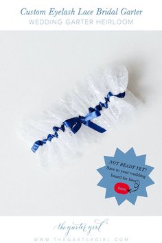 the bridal garter has blue ribbon on it