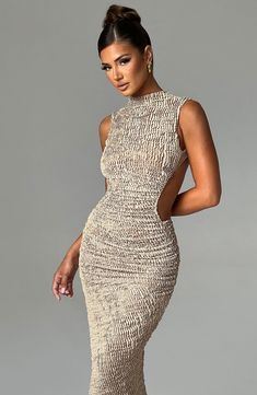 Crafted in our textured stretch fabric that hugs every curve, the Aphrodite midi features an asymmetric skirt with thigh high split. The high neck design is complete with a showstopping open back detail. Style yours with heeled mules and sleek waves. 



Colour: Beige.

Textured stretch fabric.



Open low back.

Asymmetric skirt.

Thigh high split.

Button closure at back neck.

High neck.

Midi length.

Model is an XS and is wearing an XS.

 Size: XS, S, M, L, XL, XXL Luxury Sheer Midi Dress For Evening, Luxury Sheer Midi Dress For Formal Events, Luxury Sheer Midi Dress For Formal Occasions, Luxury Draped Midi Dress For Women, Luxury Asymmetrical Neckline Bodycon Cocktail Dress, Luxury Asymmetrical Neckline Midi Dress For Dinner, Luxury Glamorous Stretch Midi Dress, Luxury Sheer Bodycon Dress For Party, Luxury Midi Halter Neck Dress With Back Opening