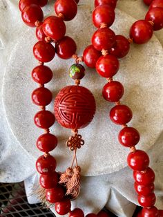 Beautiful Circa 1920s Old Chinese Carved Red CinnabarCloisonné Silk Hand Knotted Antique Vintage Long Necklace Necklace measures aprox 29 inches around not including drop Antique Red Handmade Necklaces, Artisan Red Ceremonial Necklaces, Vintage Red Ceremonial Necklace, Antique Red Necklaces With Vintage Charm, Artisan Red Ceremonial Necklace, Usa Jewelry, Rough Cut, Bib Necklaces, Necklace Necklace