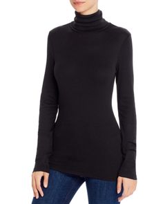 Super comfortable and a perfect addition to any wardrobe, this chic turtleneck is rendered in a luxuriously soft blend of Supima cotton and modal. Wear with leggings or skinny jeans for a streamlined silhouette. Sleek Turtleneck For Fall, Chic Fall Turtleneck In Elastane, Chic Turtleneck With Thumbholes, Chic Stretch Turtleneck In Elastane, Chic Stretch Turtleneck For Layering, Stretch Turtleneck For Fall Night Out, Chic Stretch Turtleneck, Stretch Turtleneck For Night Out In Fall, Fall Stretch Turtleneck For Night Out