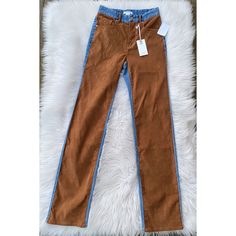 -New With Tags -Good American Icon Faux Suede & Denim Jeans -Size: 2 -Straight Leg Jeans -Stretch Denim With Contrast Panels Of Faux Suede On Front Of Jeans And Top Of Back -Slim Silhouette -5 Pockets -High Rise; 11” Rise -72% Cotton, 11% Modal, 9% Elasterell-P, 7% Recycled Material (Fiber Content Unknown), 1% Elastane -Machine Wash, Line Dry -Waist Laid Flat Measures 13”, Hips Laid Flat Measure 17” -32” Inseam *These Chic Jeans Are An Elevated Version Of Classic Straight Leg Jeans, Featuring In Trendy Brown Denim Bottoms, High Rise Brown Denim Pants, Brown Denim Pants For Fall, Trendy Brown Denim Pants, Fitted Brown Jeans For Spring, Fitted Brown Spring Jeans, Fall Brown Denim Pants, High Rise Brown Denim Bottoms, Brown Denim Pants For Spring