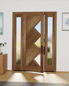 an open wooden door in a white room